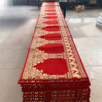 Tapis de mosquée artisanal d'inspiration géométrique offrant un entretien facile pour les espaces de prière résidentiels