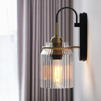 Lampe murale moderne rétro or et noir, verre transparent à rayures verticales, lumière de luxe pour salon, chevet, couloir, hôtel, intérieur