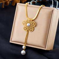 Parure de bijoux tendance en acier inoxydable plaqué or avec fleur creuse et perle, collier et boucles d'oreilles pour femme, cadeau idéal pour mariage et soirée