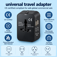 Kompakter Weltreise-Steckeradapter mit Doppel-USB-Ladeanschlüssen und Überspannungsschutz für USA, UK, EU, AU