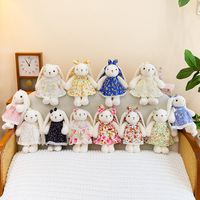 Peluche Lapin à longues oreilles et jupe fleurie, très tendance, rembourrage en coton PP, unisexe, poupée Lapin timide, cadeau pour fille, vente en gros