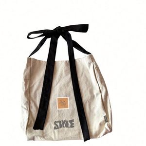 New Style Bulk Shopping Cotton Canvas Bow Tote Bags with Custom Logo - Product Image 1