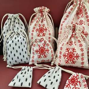 Vente en gros de pochettes en toile brodée blanche réutilisables, jolies pochettes en coton de chanvre, sac à cordon pour bougie, bijoux, cadeau - Product Image 1