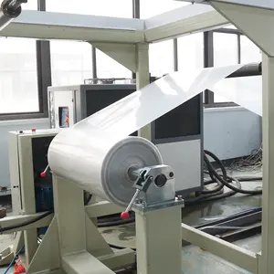 ماكينة صنع لفائف الأوراق البلاستيكية من البولي بروبلين تعمل بجهاز هيدروليكي أوتوماتيكي بالكامل وهي جزء من خط إنتاج المعدات لللفائف من البولي بروبلين والبوليستر