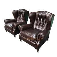 Fauteuil d'appoint de luxe vintage en cuir véritable marron, style Mid-Century, avec boutons capitonnés et dossier ailé, pour hôtel, bureau à domicile, salle à manger et villa