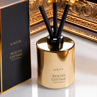 Diffuseur de parfum d'ambiance de luxe AIKUN en or avec coffret cadeau noir, idéal pour les hôtels et la décoration d'ambiance, vente en gros et en vrac