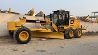 Matériel de construction en bon état, niveleuse Caterpillar 140H d'occasion