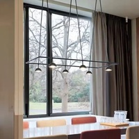 Lustre LED suspendu de haute qualité pour salle à manger d'hôtel, design artistique, minimaliste, créatif, en métal noir