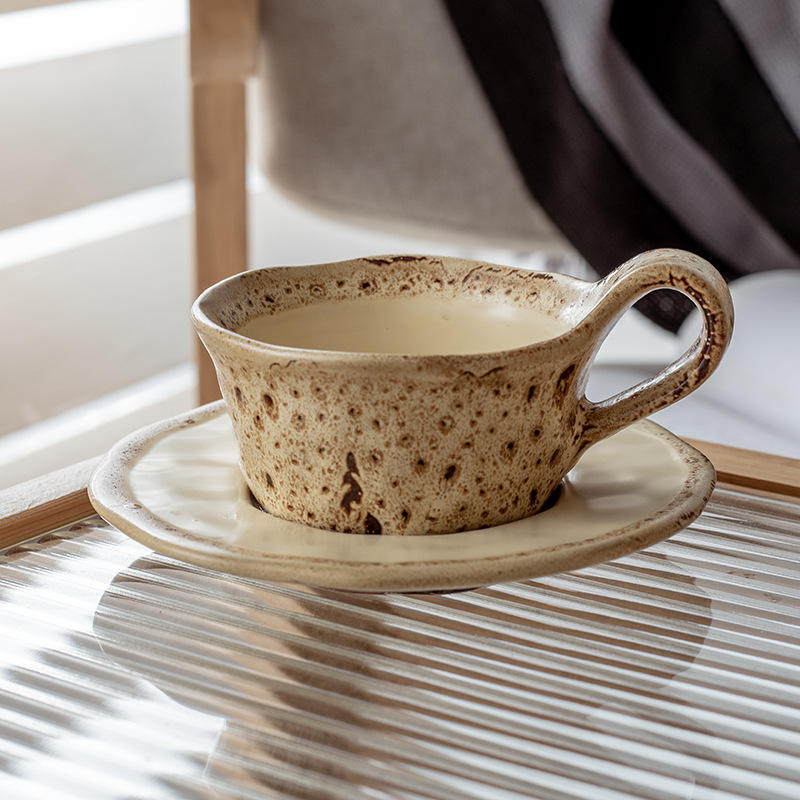 Yellow leopard-print kiln-transformed cups and saucers