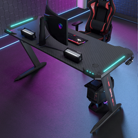 Bureau de jeu d'angle peu encombrant avec étagère de moniteur coudée et crochet pour casque d'écoute intégré pour chambres compactes