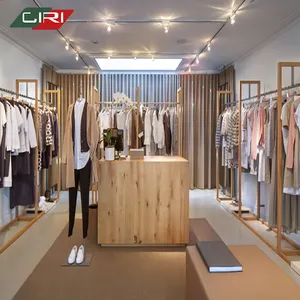 Estante de ropa de exhibición de tienda de ropa de mostrador de moda moderno personalizado de gama alta de alta calidad