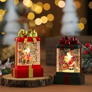 Nuevo set de regalo de Navidad con luz nocturna, vela, lámpara y adorno, estilo comercio electrónico transfronterizo, con agua y luz brillante, pequeño regalo. - Product Image 4