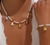 Nuevo conjunto de joyería multielementos, collar y pulsera con cuentas de perlas, joyería apilable a la moda para mujeres.