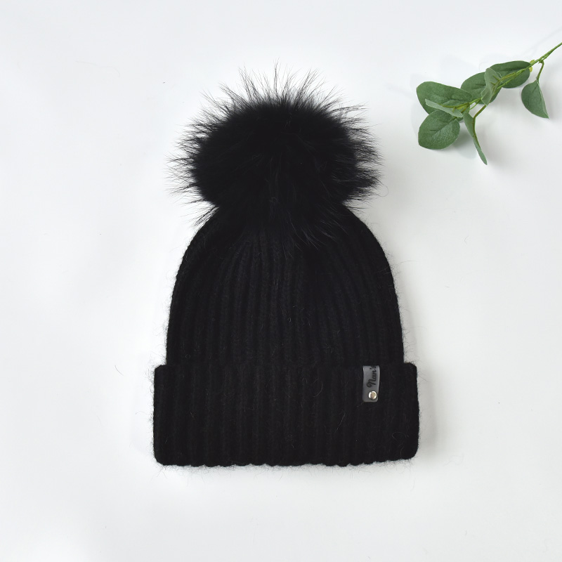Noir avec pom noir