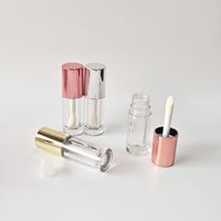 Tube de brillant à lèvres en plastique or et argent de 6 ml, emballage cosmétique vide avec impression dorée et design de gros pinceau