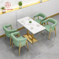 Ensemble de mobilier de restaurant moderne et durable en marbre pour café, avec banquette, chaise et table