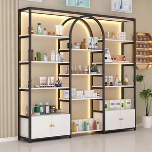 Espositore Cosmetico Moderno in Metallo <span class=keywords><strong>con</strong></span> Design ad Arco e Illuminazione LED, <span class=keywords><strong>con</strong></span> Armadietto per Negozi di Bellezza - Product Image 1