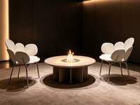 Table de feu à gaz ronde artistique, foyer circulaire s'intègre parfaitement aux intérieurs modernes et aux paysages extérieurs