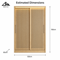 Armoire coulissante en chêne clair avec deux portes cannelées pour rangement de chambre, livrée en kit