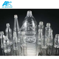 Machine de soufflage de bouteilles pour petites productions, ligne de remplissage de bouteilles en plastique PET pour eau minérale pure