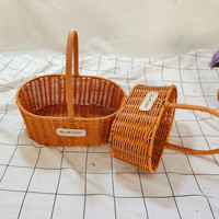 Panier en rotin PE fabriqué en usine pour cadeau ou décoration florale de la maison avec cadre en métal, imperméable, lot de 2