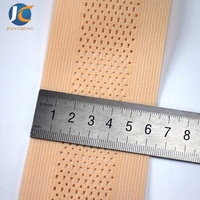Bande élastique respirante perforée en polyester et latex OEM ODM pour soutien abdominal post-chirurgical et maternité