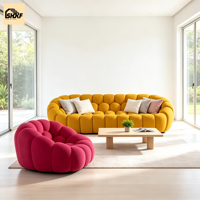 Ensemble de canapés modulaires ronds en tissu bouclé sur mesure, dossier en forme de biscuit, pour réception d'hôtel et salon de villa