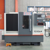 Machine de tournage CNC automatique TCK36A pour la découpe de raccords standard stables avec armoire de commande numérique séparée