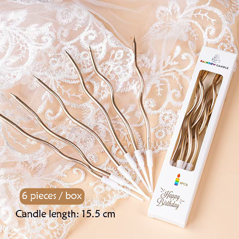 Candele curve color champagne
