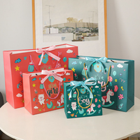 Boîte cadeau personnalisée de luxe en papier écologique avec impression offset et design sur mesure pour la promotion de fête de révélation du sexe