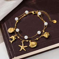 Bracelet double couche en acier inoxydable plaqué or 18 carats avec breloques océaniques, perle, étoile de mer, dauphin et coquillage, bracelet d'été pour femme
