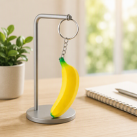 Porte-clés anti-stress en forme de banane en PU avec logo personnalisé, simulation de fruit, cadeau promotionnel publicitaire, image de marque d'entreprise YLX