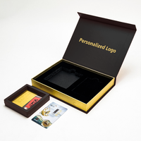 Boîte cadeau en carton noir en forme de livre avec fermeture magnétique personnalisée, avec insert en mousse
