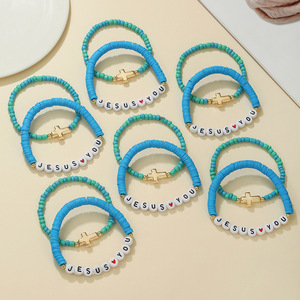 Meilleures ventes Bracelet tendance en céramique souple coloré avec lettres et croix plaqué or unisexe - Product Image 4