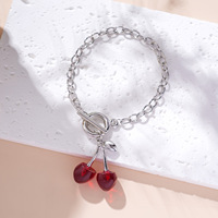 Parure de bijoux élégante pour femme, motif cerise rouge et noire vintage, comprenant boucles d'oreilles clous à pompon, collier, bracelet chaîne cordon et chaîne de clavicule OT