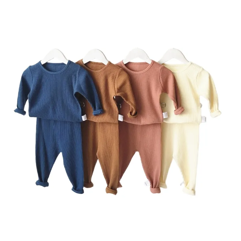 Vendita calda vestiti per bambini di fascia alta tinta unita a coste bambino 2 pz pigiama a coste in cotone set di abbigliamento per neonato a buon mercato