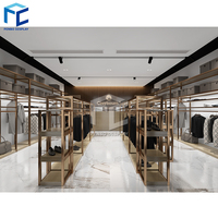 Étagère de présentation de vêtements en métal pour magasin de vêtements, décoration de boutique, présentoir de vêtements brillant doré