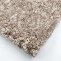 Tissu en fausse fourrure d'agneau flocon de neige à prix d'usine pour vêtements