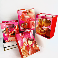 Glanzend roze gouden hartvormige papieren cadeauzakjes, diverse maten, met koordhandvatten voor Valentijnsdag, bruiloft, verjaardag, feestdagen en cadeauverpakkingen.