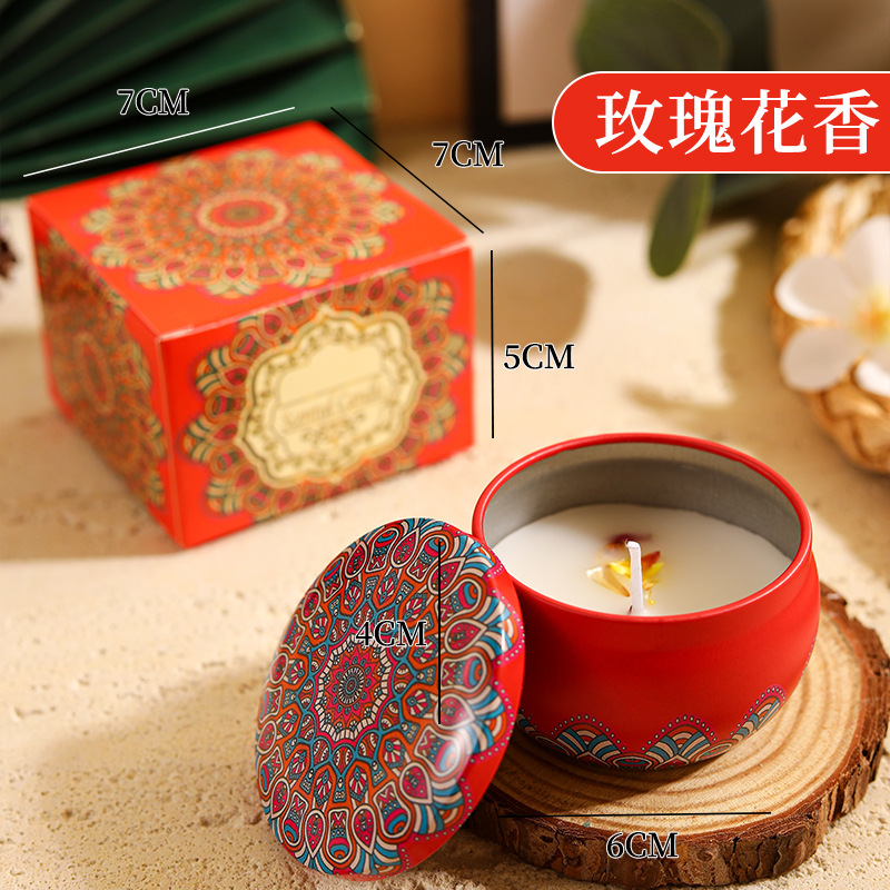 Rose-shaped candle in a tin box