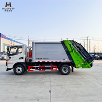 Camion de compactage des déchets municipaux HEAVSTY 7m, moteur diesel, châssis Yuchai 140HP, empattement 3365 mm