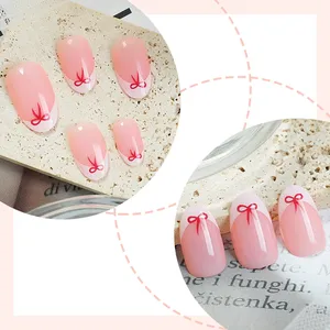 24 <span class=keywords><strong>Uñas</strong></span> <span class=keywords><strong>Postizas</strong></span> Cortas Color Nude Rosa Blanco <span class=keywords><strong>con</strong></span> Diseño <span class=keywords><strong>de</strong></span> Lazo Rojo, Cobertura Completa, Removibles, Reutilizables, <span class=keywords><strong>de</strong></span> Plástico ABS <span class=keywords><strong>de</strong></span> Alta Calidad - Product Image 1