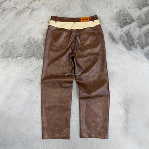 Pantalones de cuero sintético de cintura alta vintage con diseño de logotipo de diamantes de imitación personalizados, estilo streetwear, holgados y apilados - Product Image 2