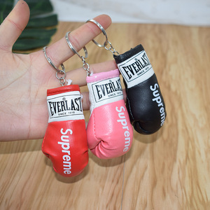 Porte-clés en cuir PU en forme <span class=keywords><strong>de</strong></span> mini-gants <span class=keywords><strong>de</strong></span> <span class=keywords><strong>boxe</strong></span>, cadeaux pour fans <span class=keywords><strong>de</strong></span> <span class=keywords><strong>boxe</strong></span>, porte-clés sport 3D, accessoires <span class=keywords><strong>de</strong></span> luxe pour sac et voiture - Product Image 1
