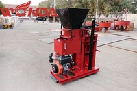 Idées de machine pour petites entreprises ciment sable argile rouge terre terre machine de fabrication de blocs de briques à emboîtement hydraulique brique pressée