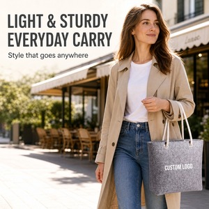 กระเป๋าผ้าแคนวาส PP สีดำแบบขายส่ง พิมพ์โลโก้ได้ เป็นมิตรกับสิ่งแวดล้อม พร้อมหูหิ้วริบบิ้นยาว ทนทาน เหมาะสำหรับใส่ของช้อปปิ้ง - Product Image 2