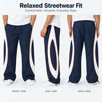 Pantalon de survêtement vintage haut de gamme 100 % nylon, personnalisé OEM, avec broderie artistique, coupe décontractée, taille élastique, style streetwear pour homme