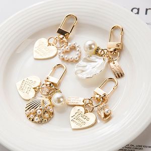 Factory Directly Sales Mini Cute Creative Metal Shell <b>Key</b> <b>Chains</b> for Beach Souvenirs and Bag Pendants and Small Gifts - Product Image 1