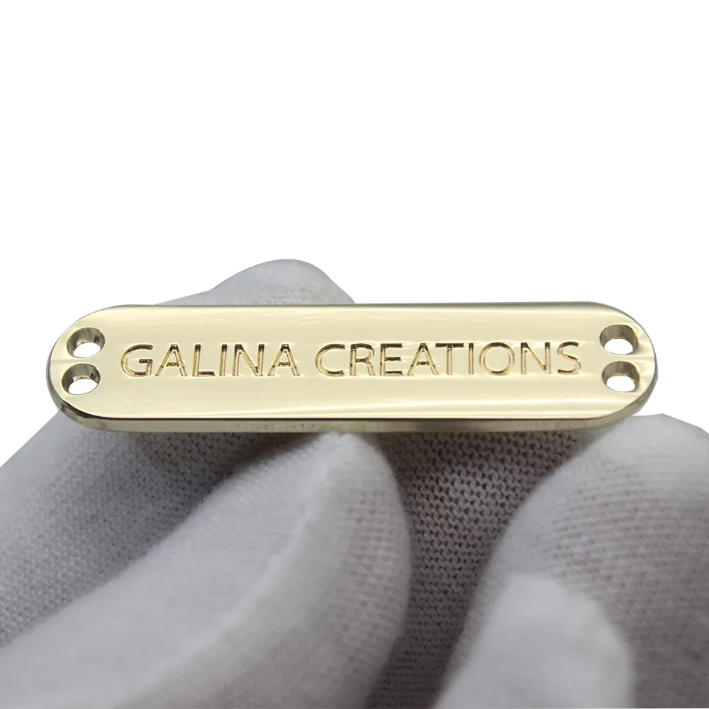 Nice Quality Shiny Light Gold Customized Logo Metal Label Engraved Brand Name Sewing Tags for Bags and Clothes