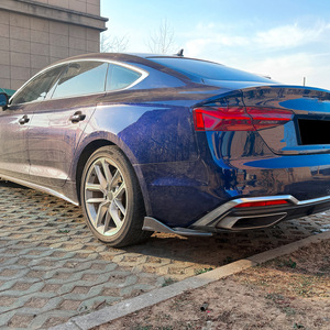 ขอบมุมท้ายรถยนต์ Audi A5 S5 F5 S-line Sportback ปี 2021-2024  วัสดุ ABS สีดำเปียโนลายคาร์บอนไฟเบอร์  แบบติดกาว - Product Image 1